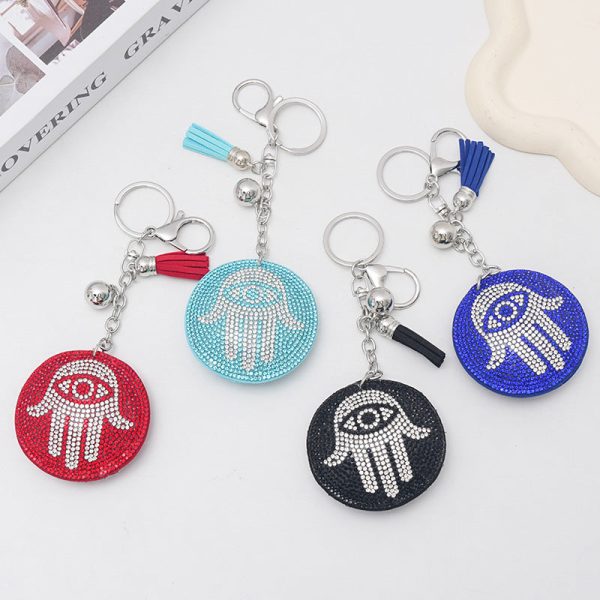 Wholesale Creative Devil s Eye Palm Hot Diamond Keychain For Discount