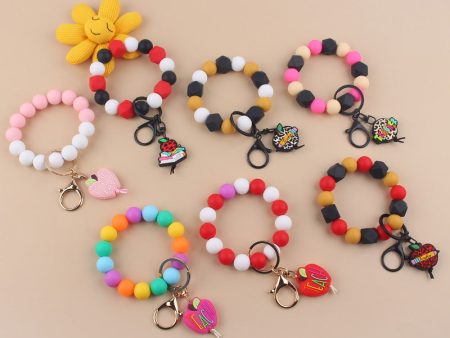 Wholesale Cartoon Apple Teacher Pencil Silicone Beaded Wrist Keychain For Sale